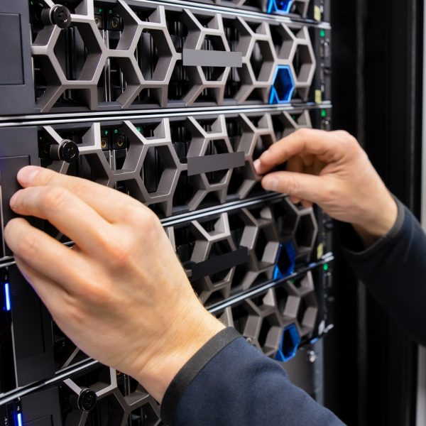 Hands Of Male IT Support Professional Adjusting Hardware Hands Of Male IT Support Professional Adjusting Hardware